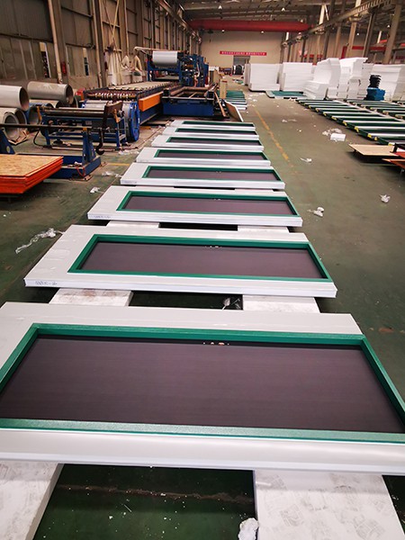 Wall panel production for flat pack container house Wall panel production for flat pack container house